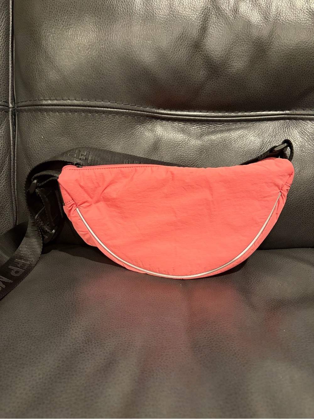 FP Movement by Free People Coral Crescent Crossbody Bag with Black Strap